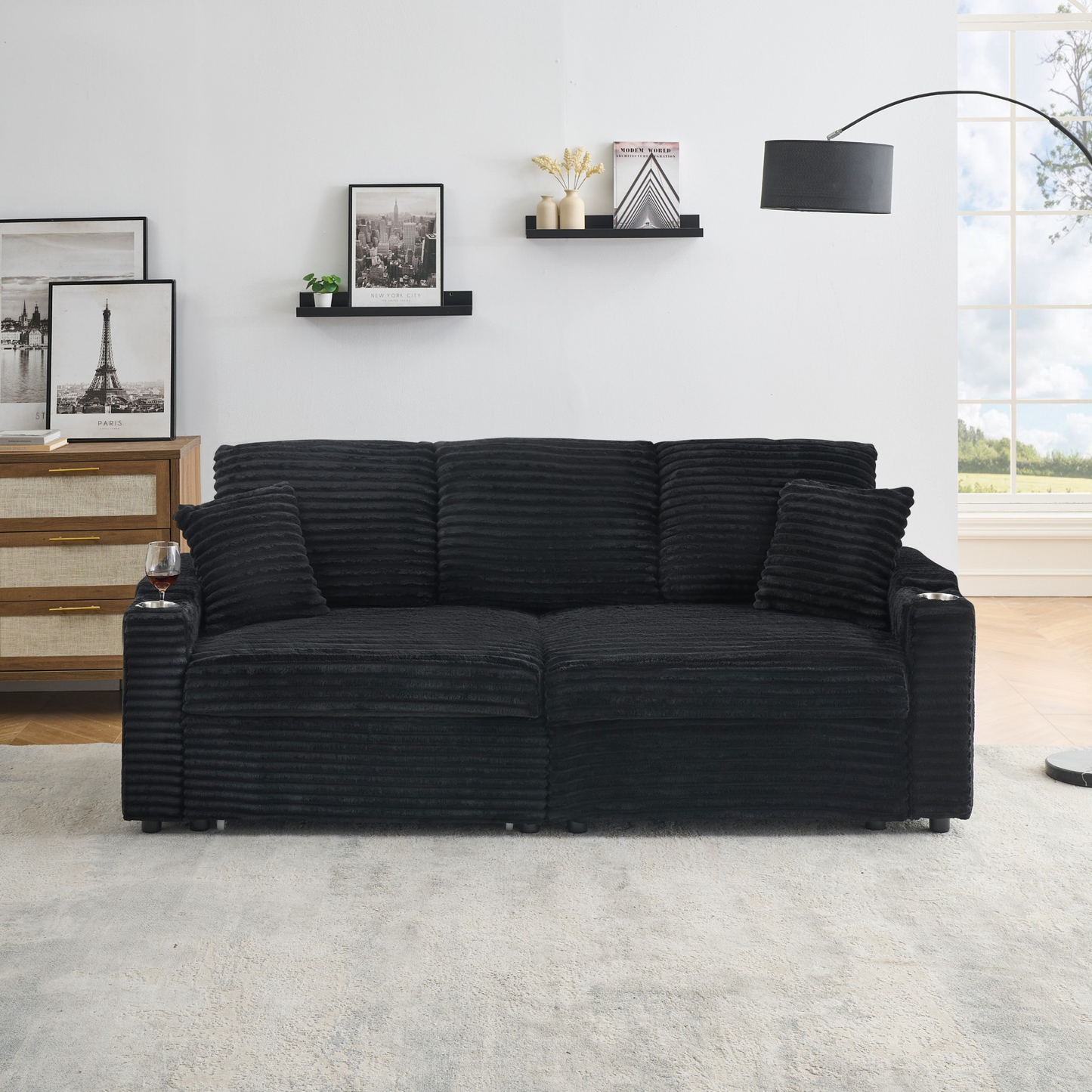 An 80-inch two-in-one pull-out, foldable and hidden chaise longue black corduroy sofa with cup holders and pillows, which is suitable for the living room.