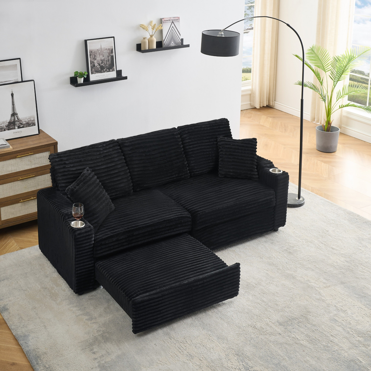An 80-inch two-in-one pull-out, foldable and hidden chaise longue black corduroy sofa with cup holders and pillows, which is suitable for the living room.